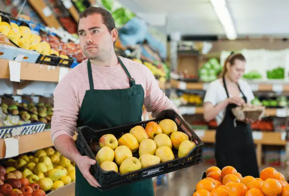 Worker with fruits