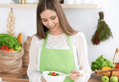 Woman making salad